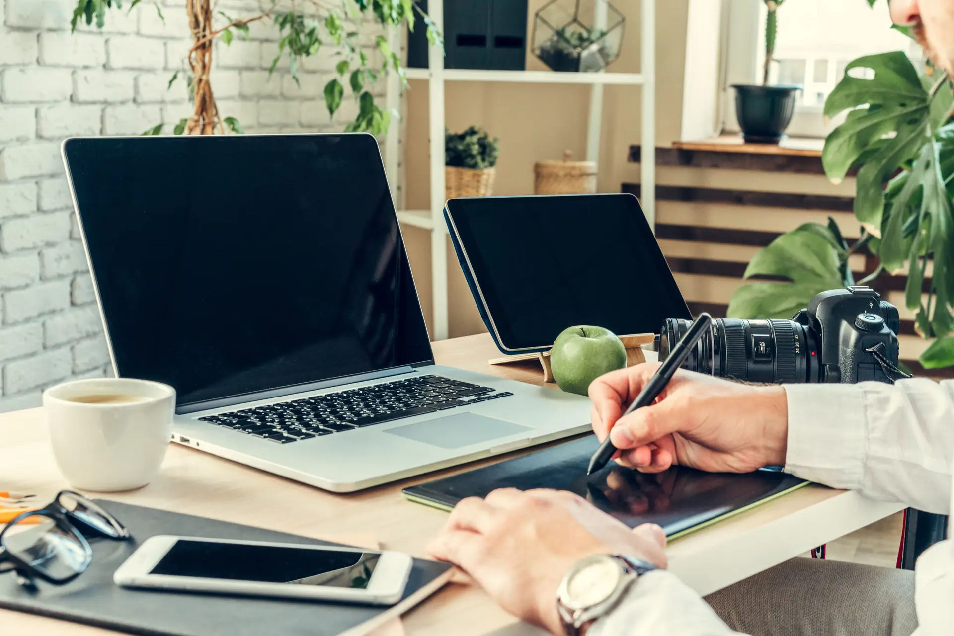 close up of a working table of a businessman with laptop