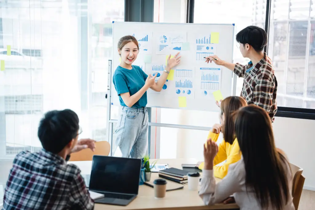 successful business people present analytics reports while worki